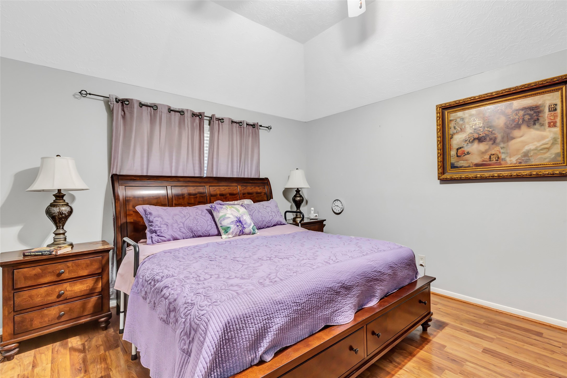 1014 North Rivershire Drive Conroe, TX 77304 - Photo 34 of 37 a bedroom with a bed and a dresser