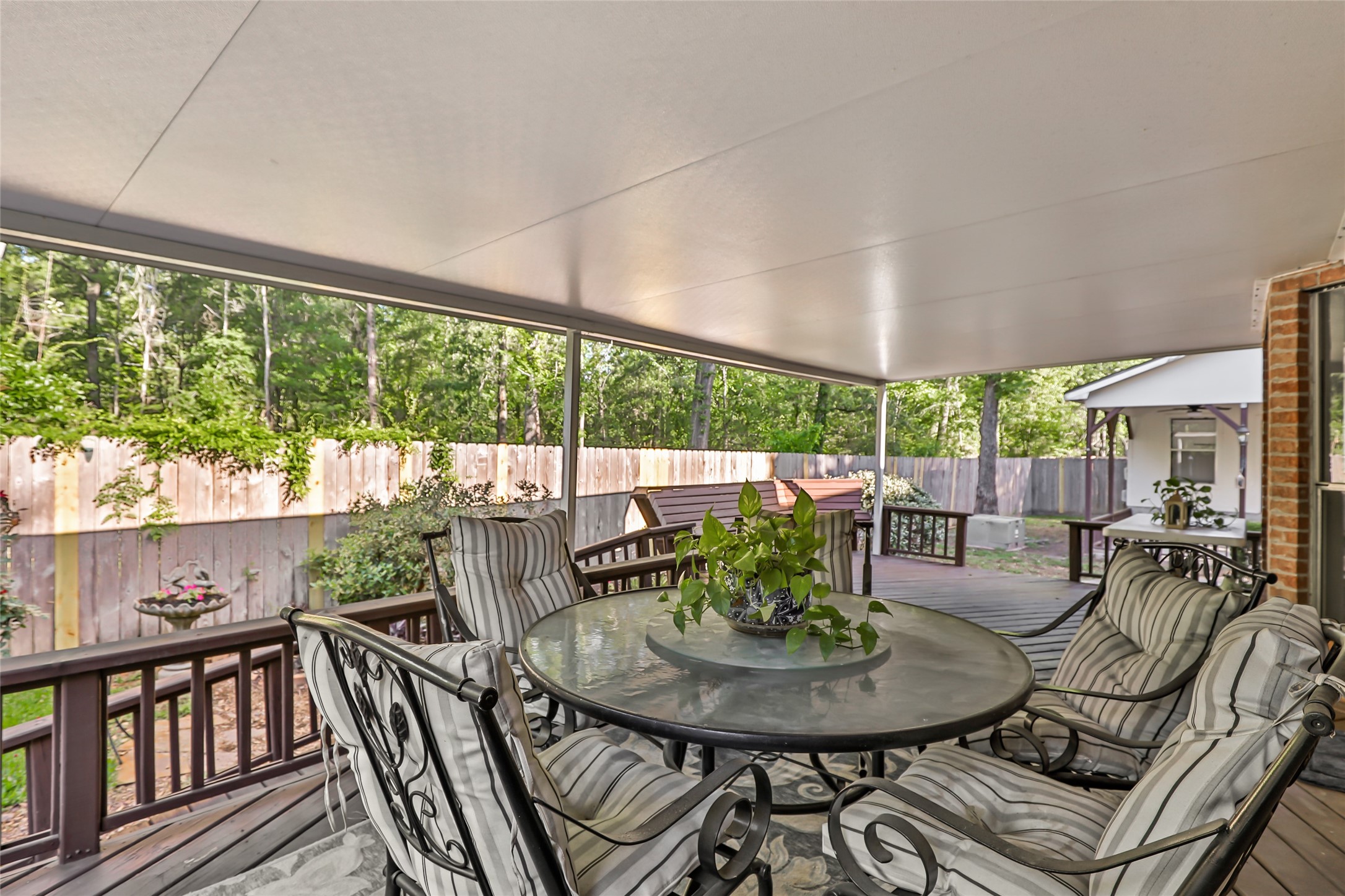1014 North Rivershire Drive Conroe, TX 77304 - Photo 8 of 37 a dining room with furniture window and wooden floor
