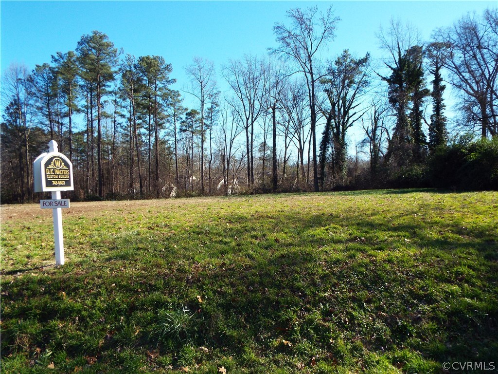 3213 Osborne Road Chester, VA 23831 - Photo 3 of 3 a backyard of a house with lots of green space
