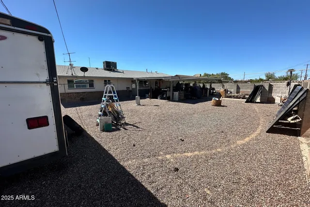 a terrace of a house with outdoor seating