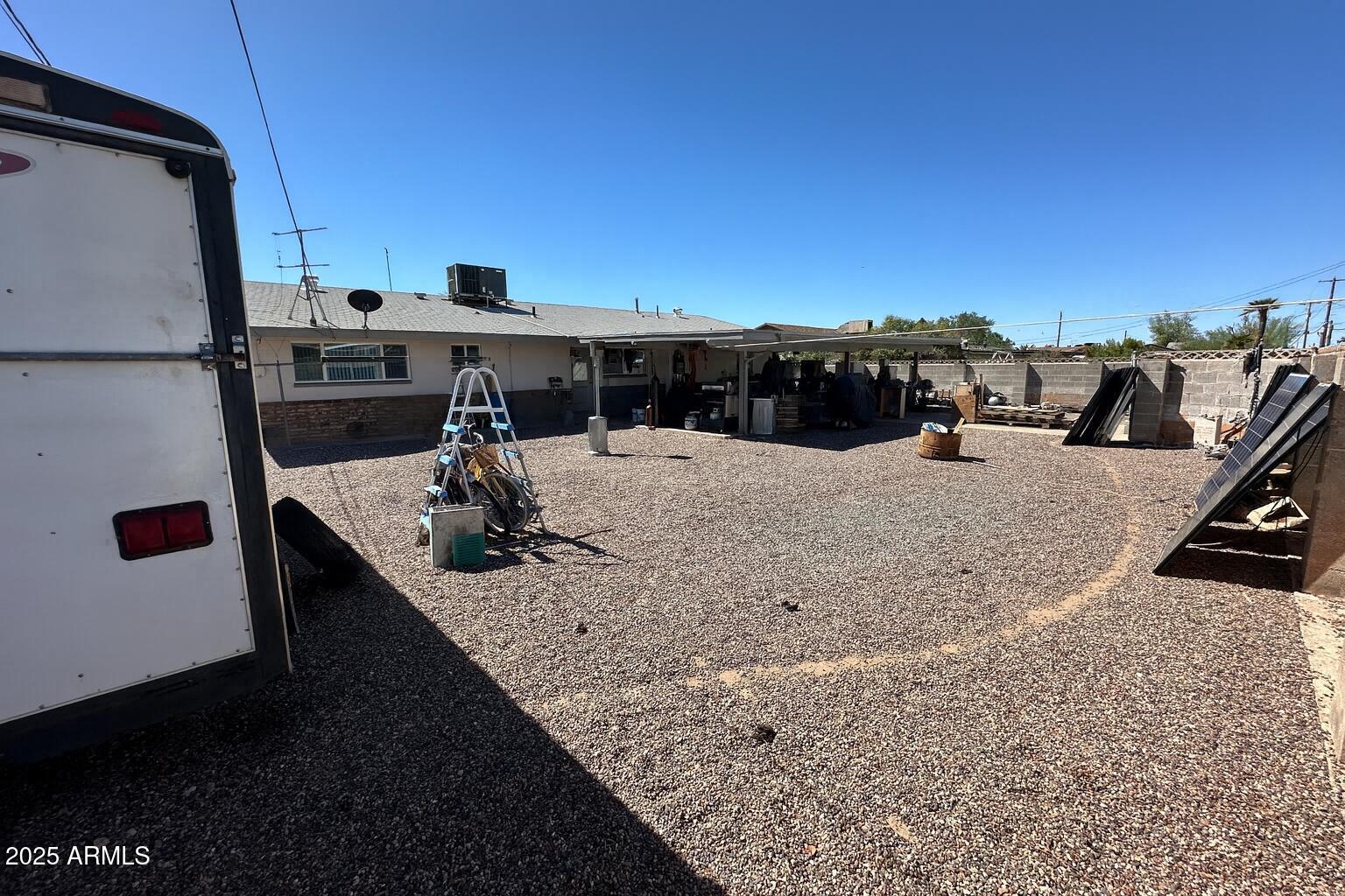 610 East Estevan Avenue Apache Junction, AZ 85119 - Photo 14 of 15 a terrace of a house with outdoor seating