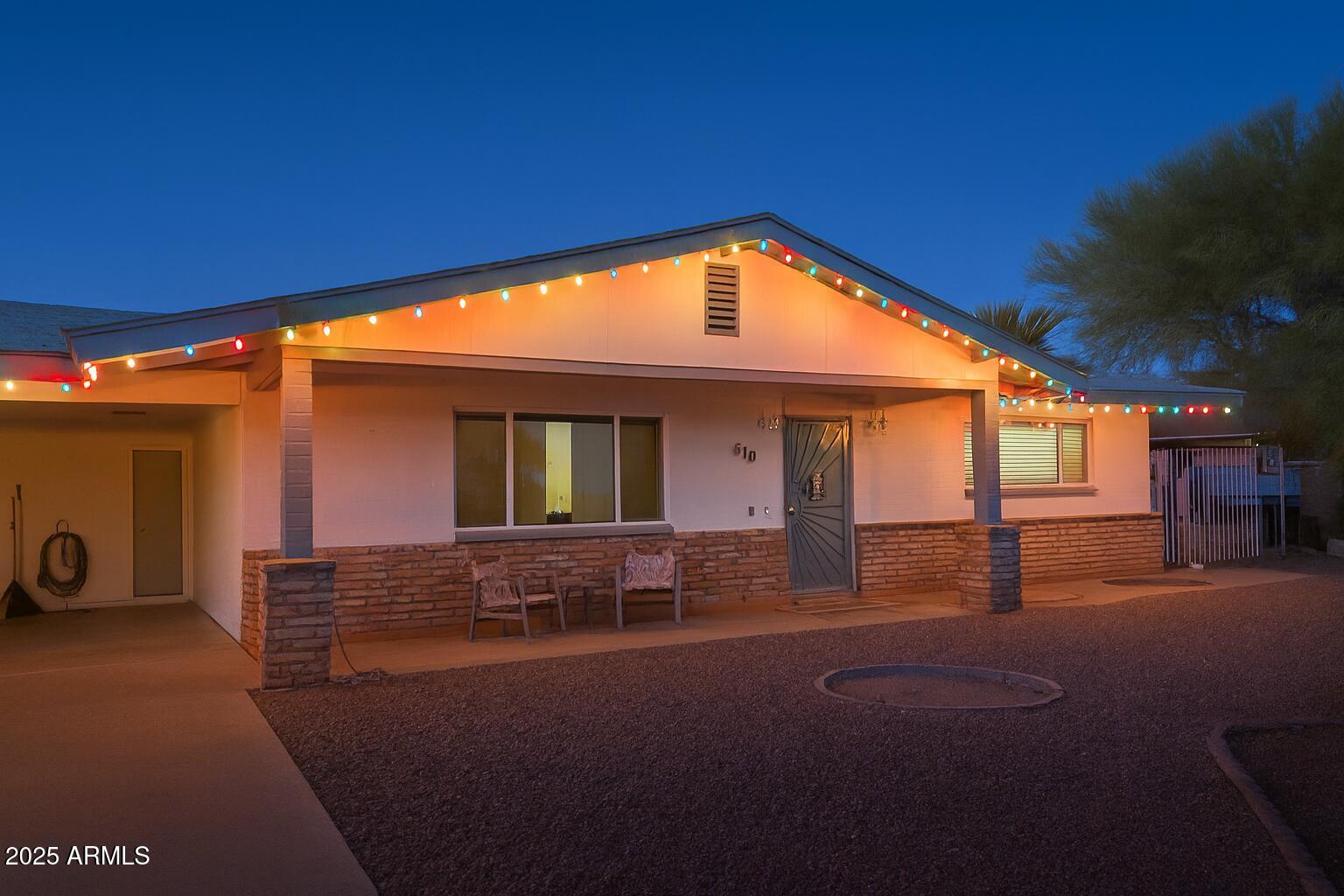 610 East Estevan Avenue Apache Junction, AZ 85119 - Photo 15 of 15 a view of a house with a patio