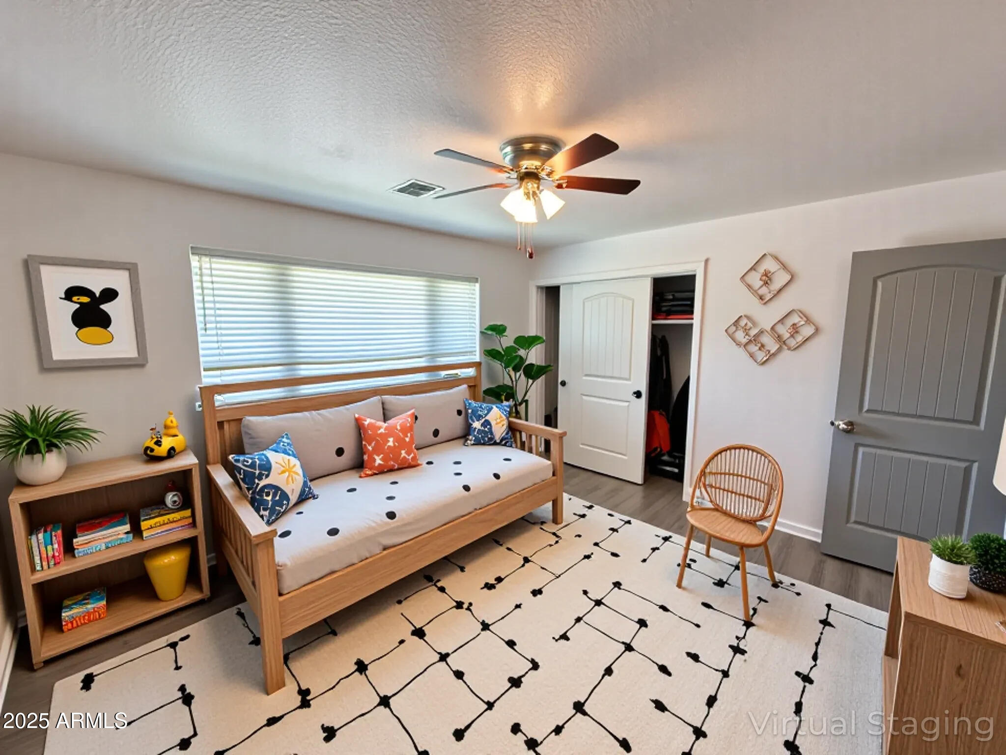 610 East Estevan Avenue Apache Junction, AZ 85119 - Photo 8 of 15 a bedroom with furniture and a chandelier