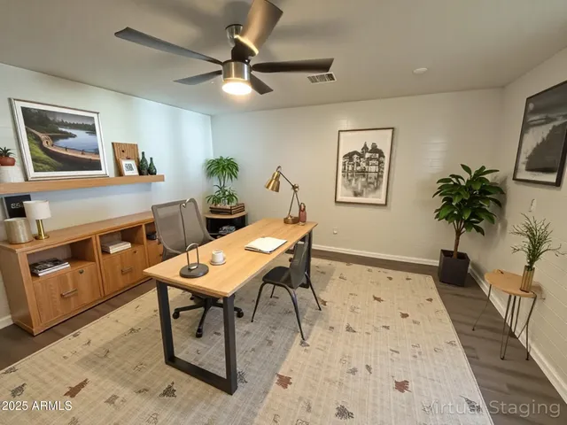 a view of a livingroom with furniture
