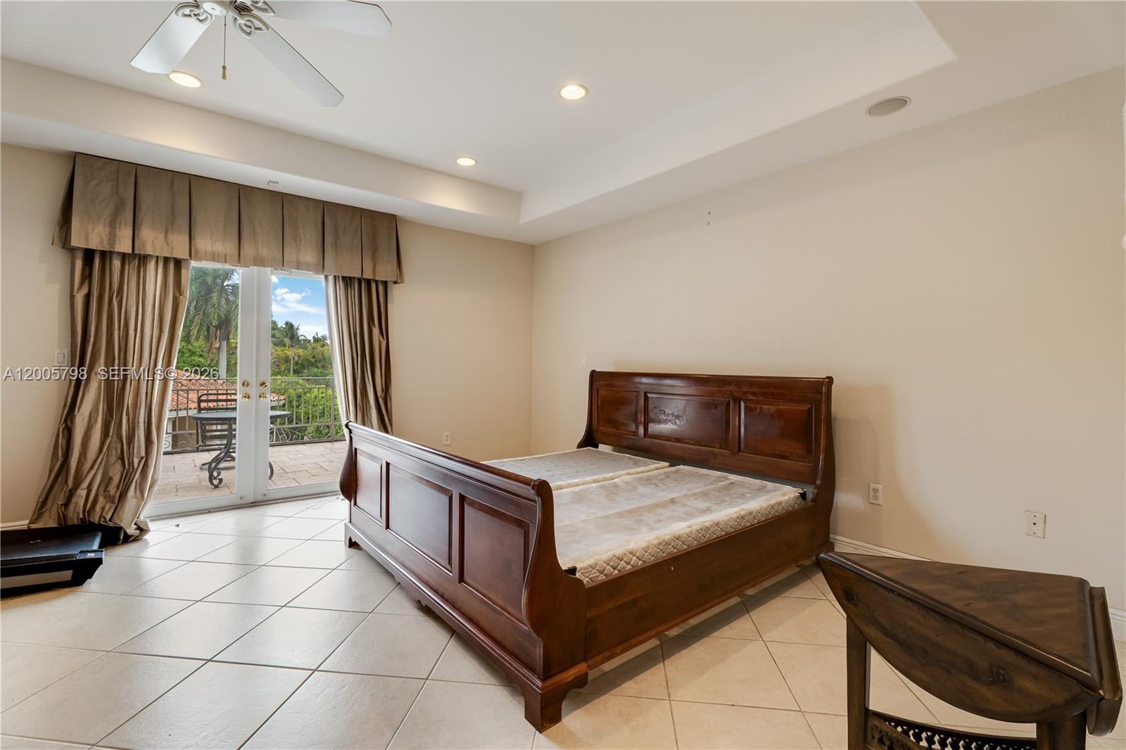11071 Southwest 28th Street Miami, FL 33165 - Photo 42 of 78 a bedroom with a bed and a walk in closet