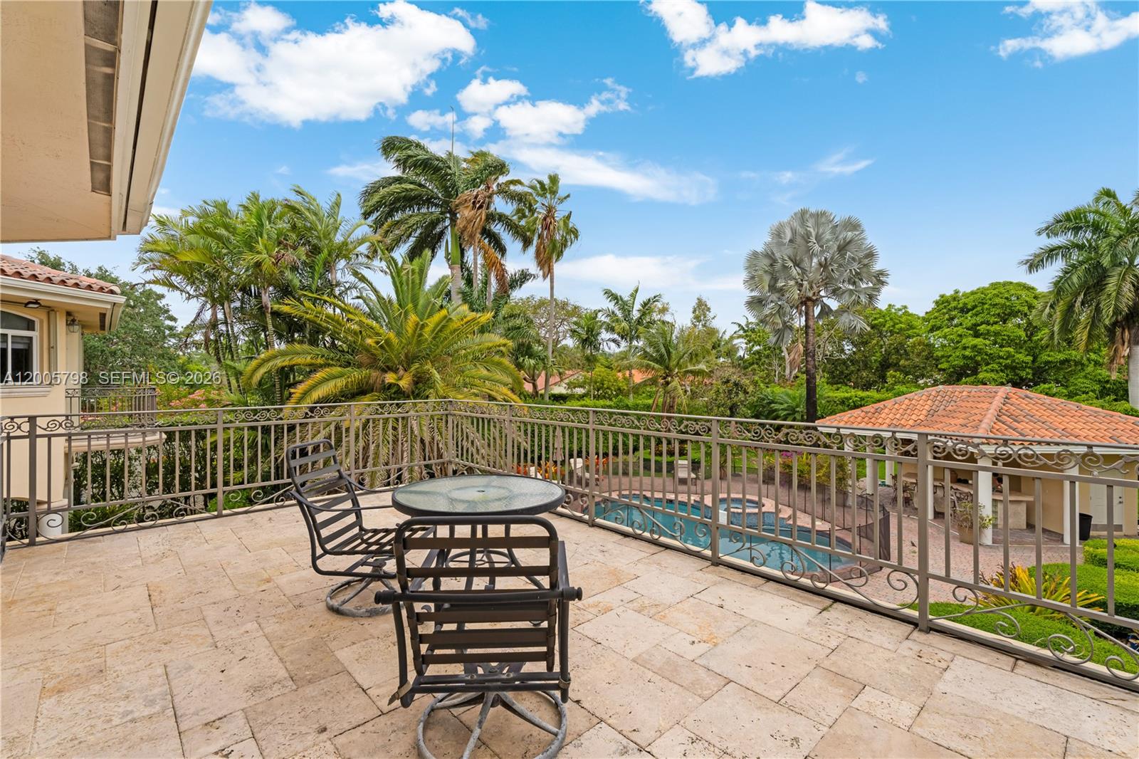 11071 Southwest 28th Street Miami, FL 33165 - Photo 44 of 78 a view of a chairs and table in patio with swimming pool