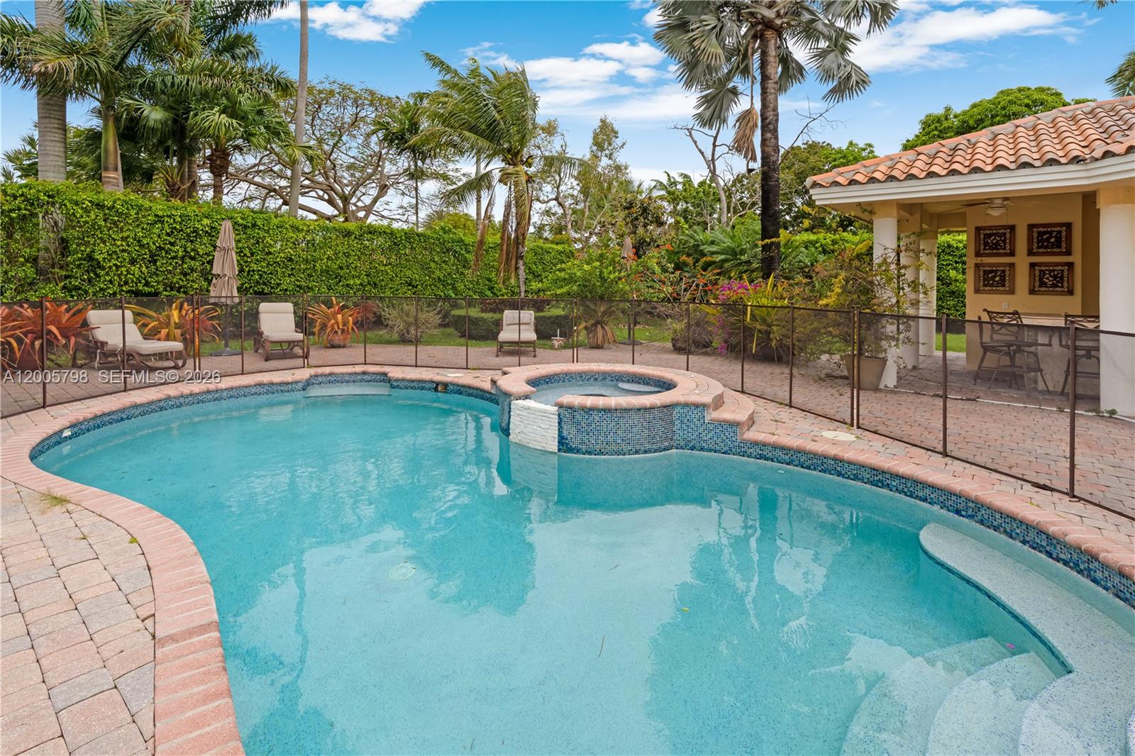 11071 Southwest 28th Street Miami, FL 33165 - Photo 55 of 78 a view of a backyard with swimming pool