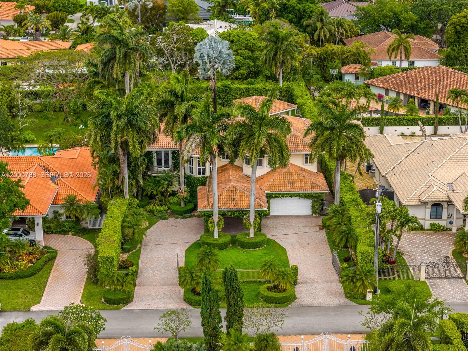 11071 Southwest 28th Street Miami, FL 33165 - Photo 68 of 78 an aerial view of a house with garden space and a patio