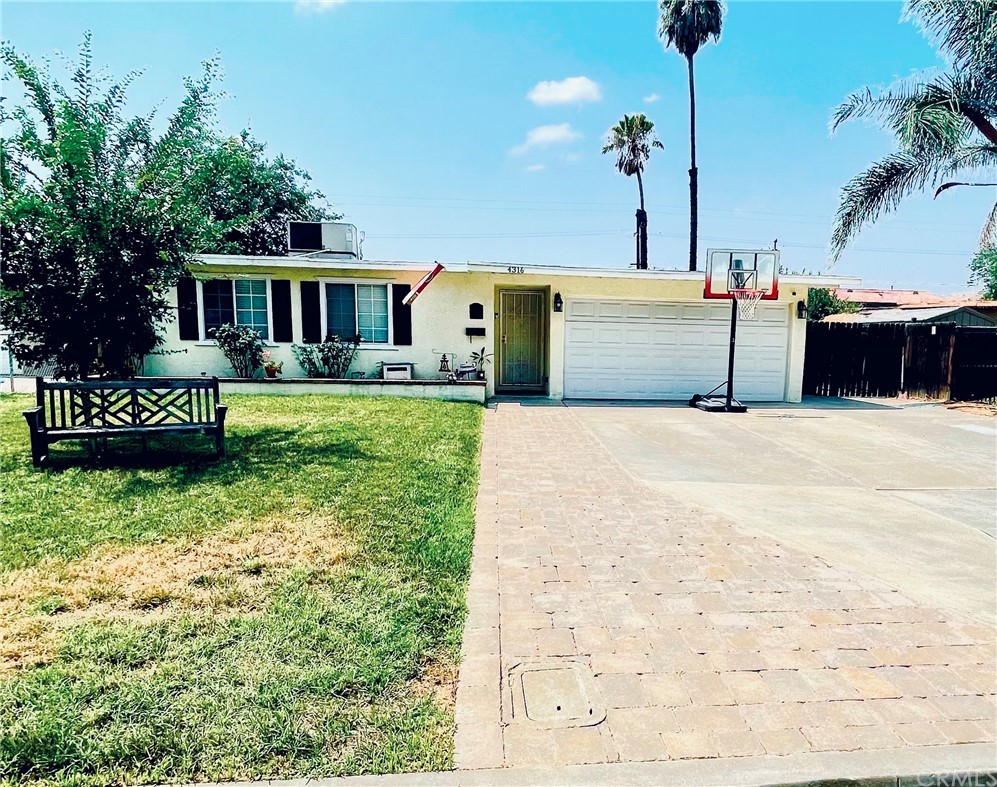 4316 Eileen Street Riverside, CA 92504 - Photo 1 of 1 a front view of a house with a yard