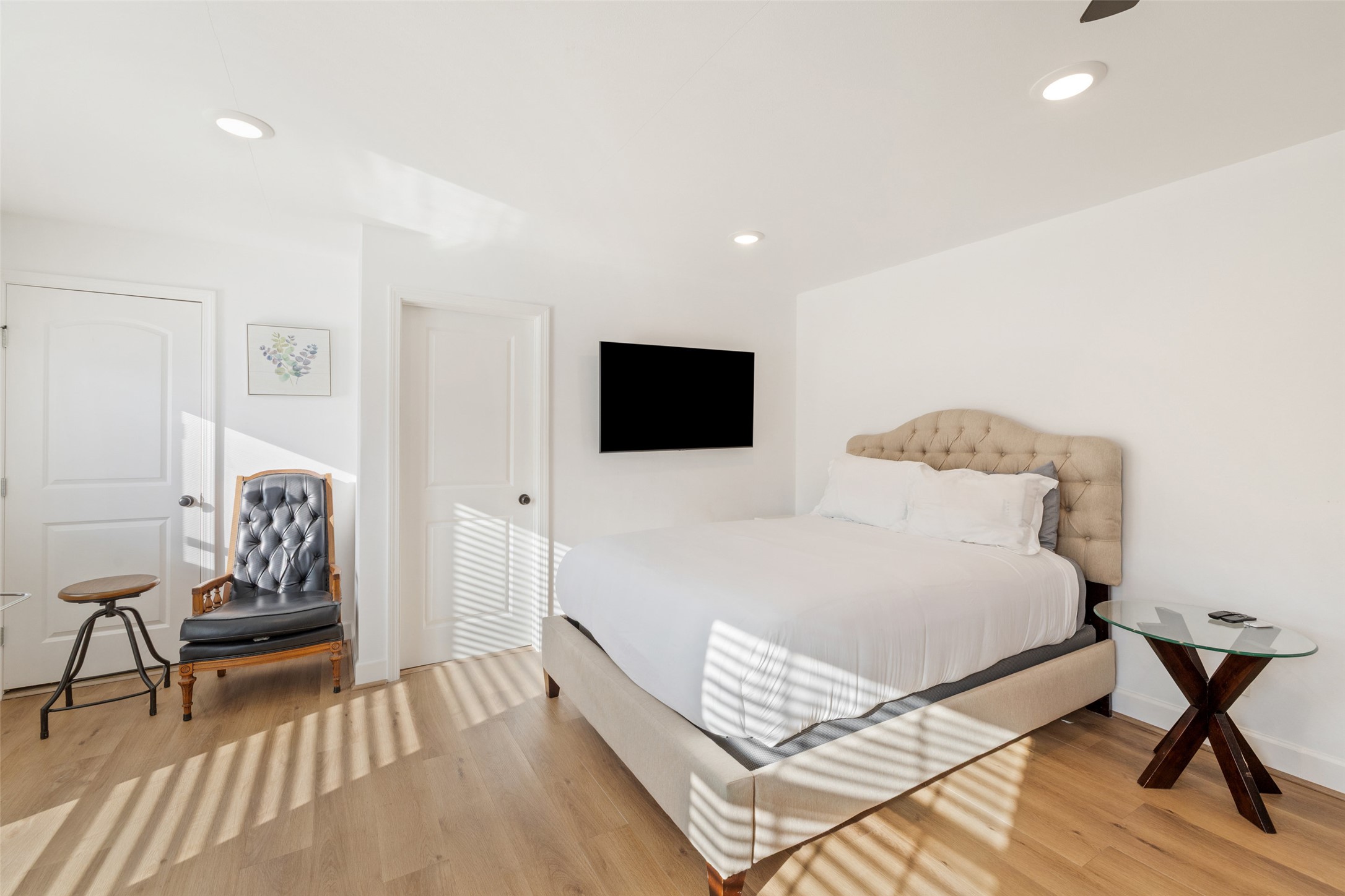 5519 Hiline Road Austin, TX 78734 - Photo 30 of 40 Bedroom featuring baseboards, light wood-style flooring, and recessed lighting