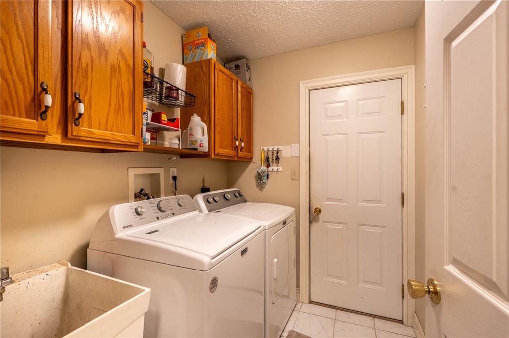 228 Country View Drive Lower Burrell, PA 15068 - Photo 20 of 49 a utility room with dryer and washer