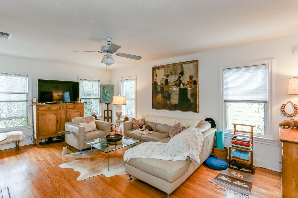 1740 Banks Street, Unit 2 Houston, TX 77098 - Photo 3 of 22 a living room with furniture flat screen tv and window