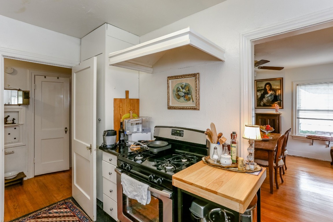 1740 Banks Street, Unit 2 Houston, TX 77098 - Photo 5 of 22 a kitchen with a table and chairs in it