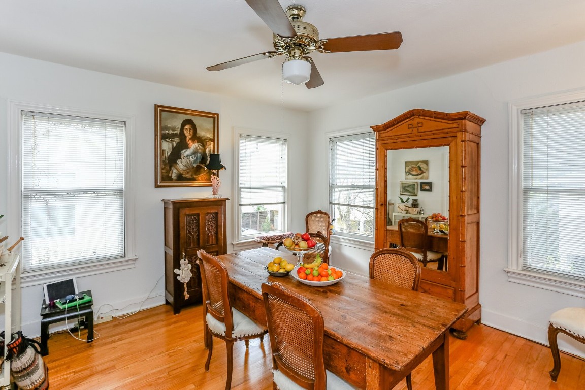 1740 Banks Street, Unit 2 Houston, TX 77098 - Photo 9 of 22 a view of a dining room with furniture window and wooden floor
