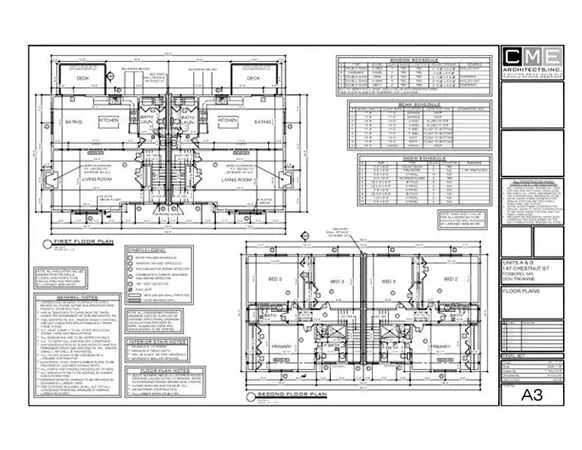 a black and white photo of a living room