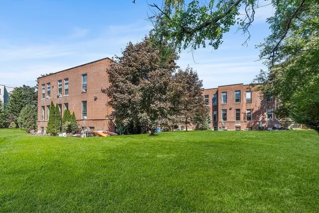 a view of a building with garden