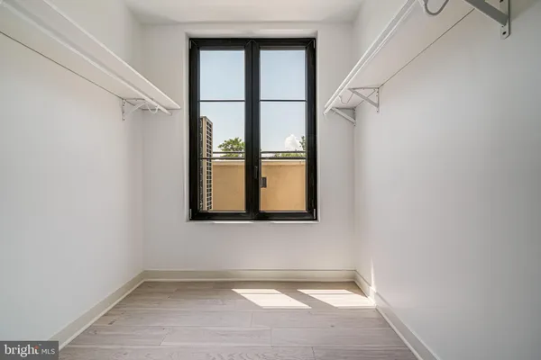 a view of an empty room with a window