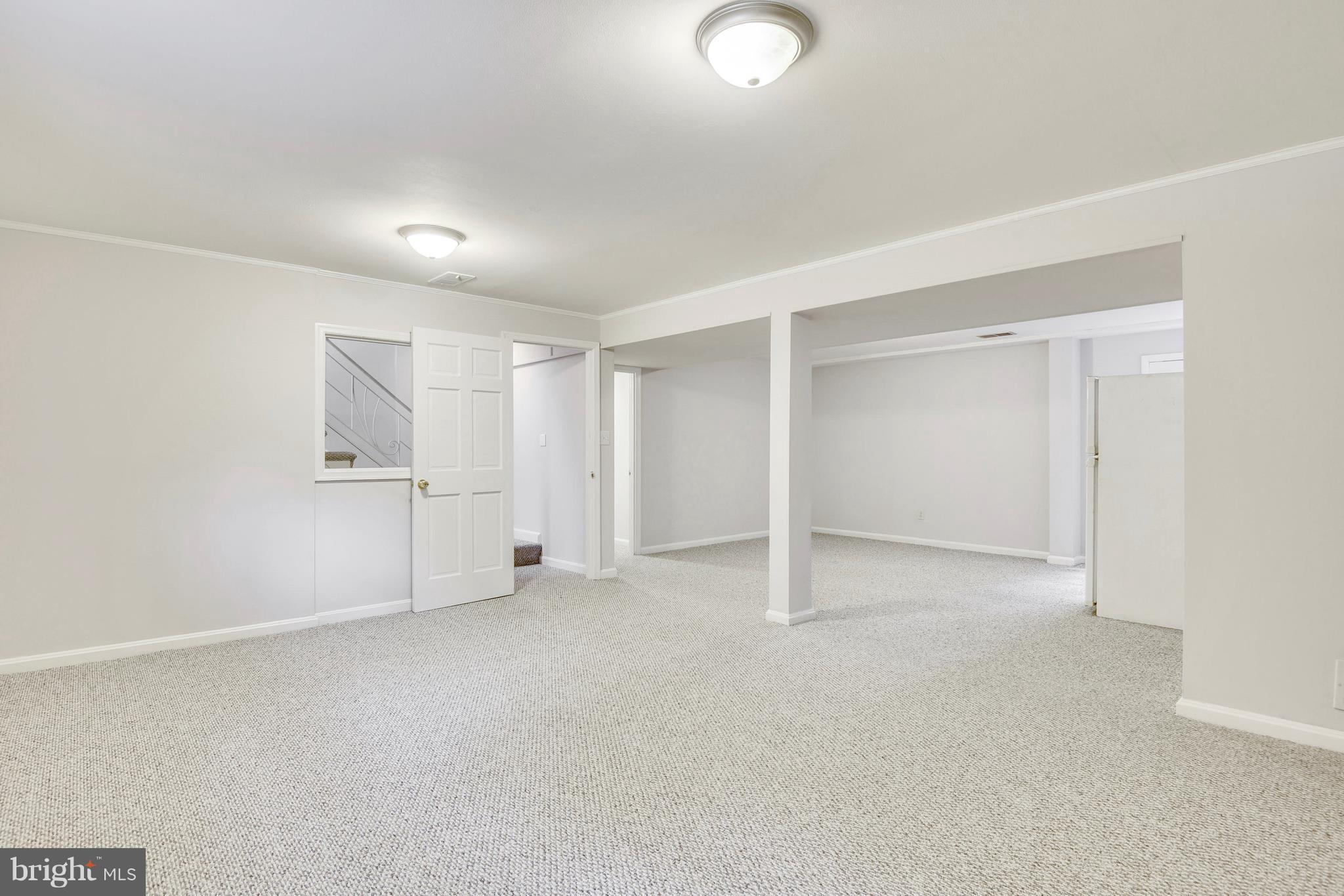 9005 Bradford Road Silver Spring, MD 20901 - Photo 19 of 28 an empty room with closet area