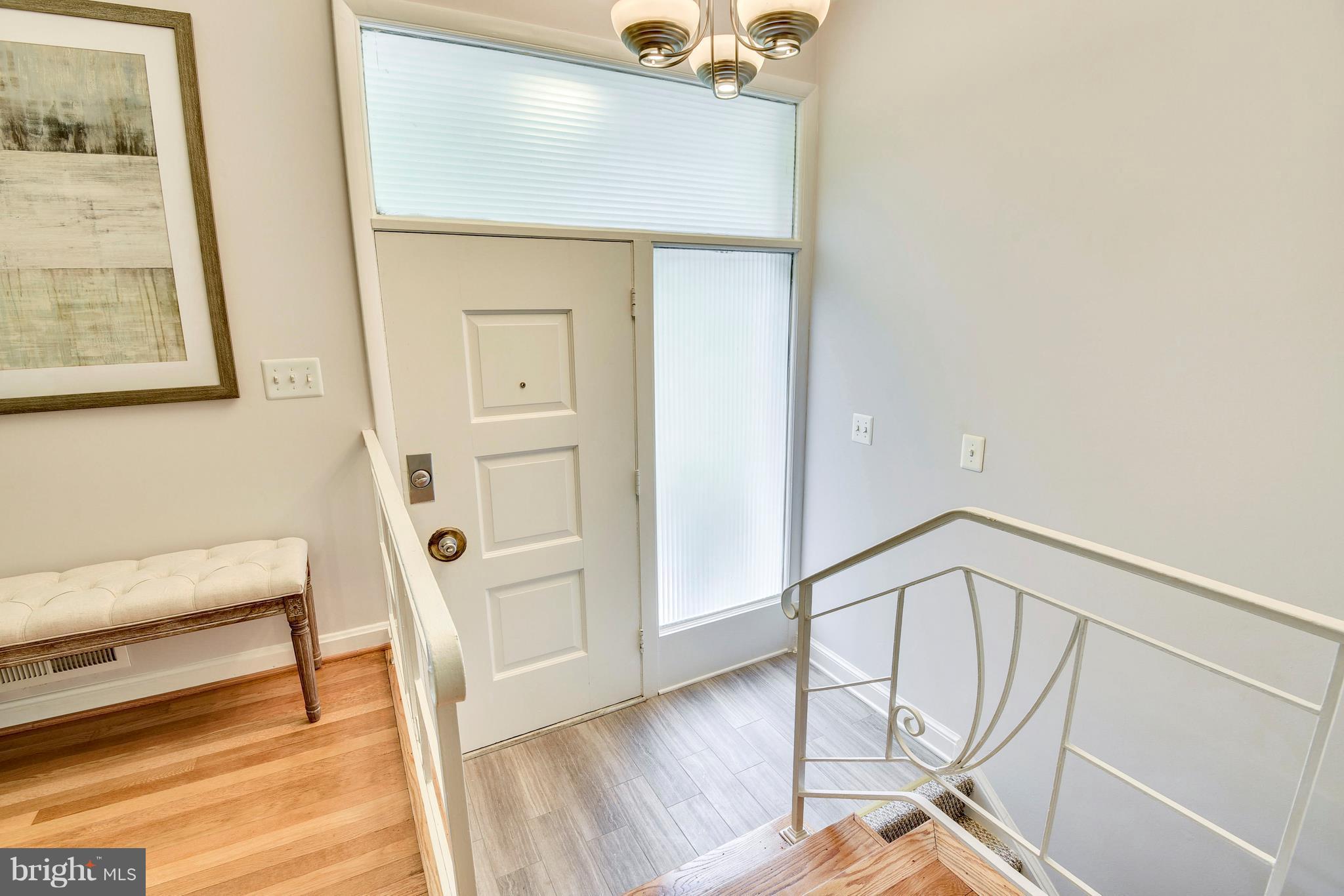 9005 Bradford Road Silver Spring, MD 20901 - Photo 3 of 28 a view of an entryway with wooden floor