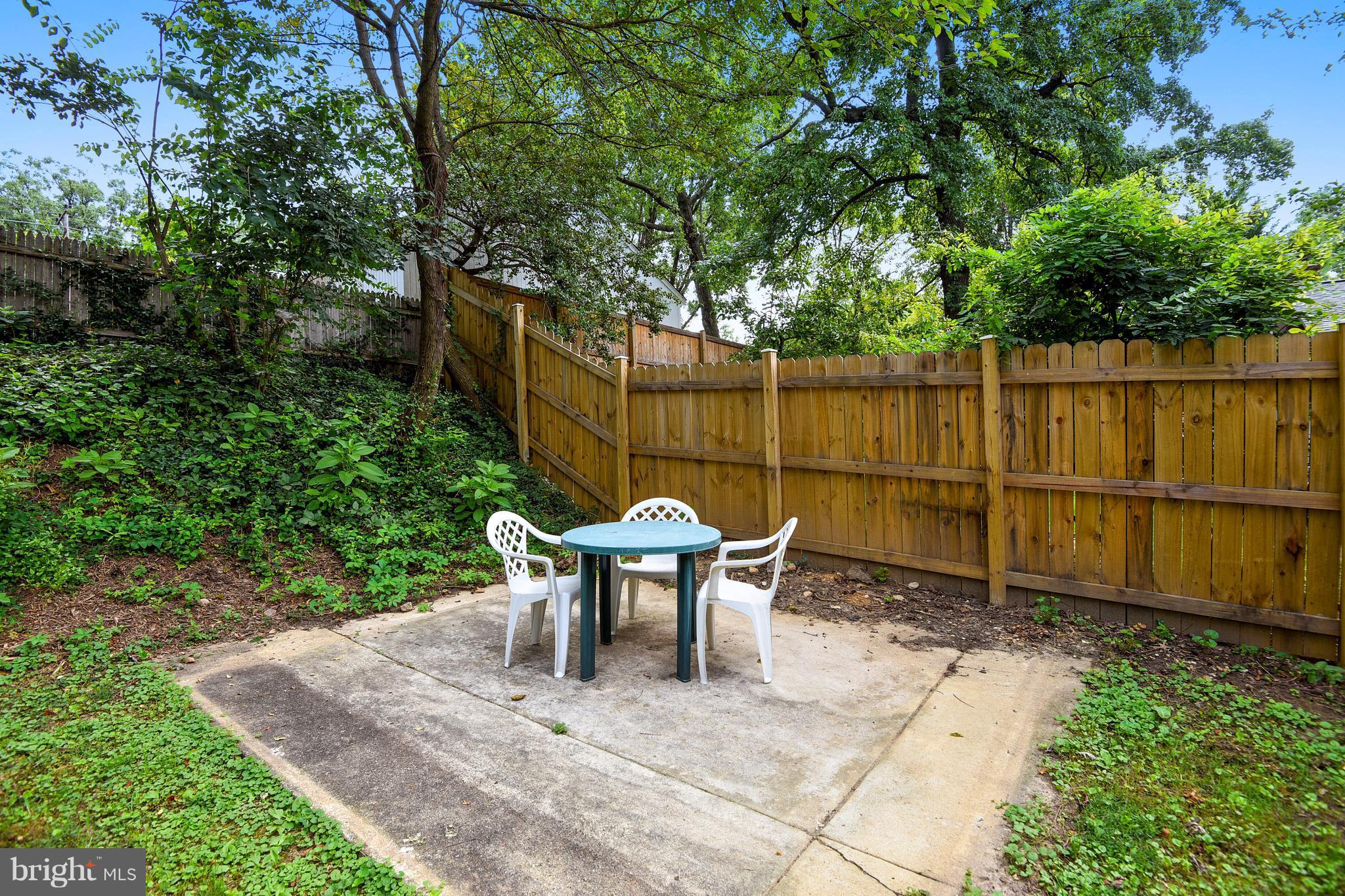 9005 Bradford Road Silver Spring, MD 20901 - Photo 25 of 28 a view of a bench in the backyard