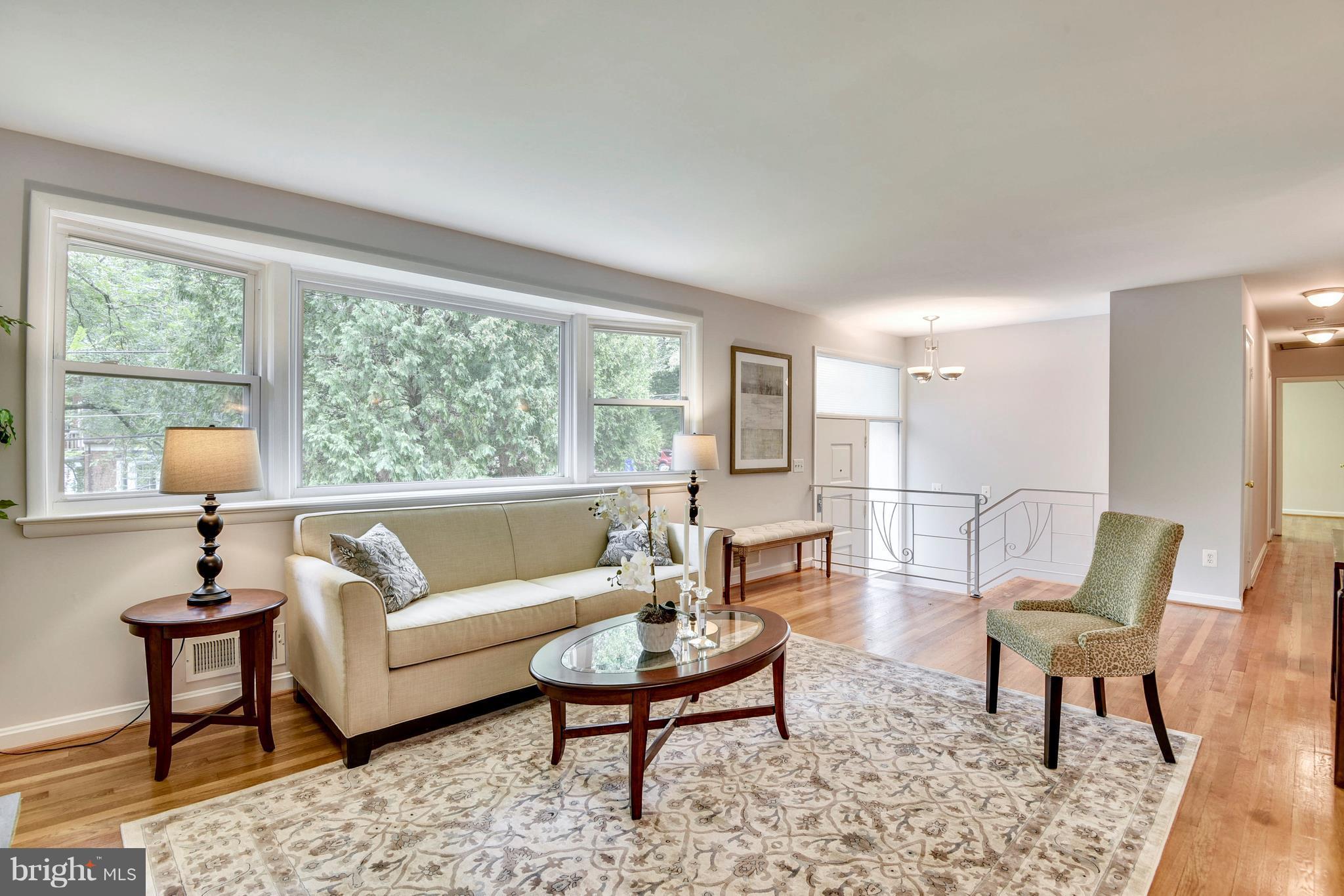 9005 Bradford Road Silver Spring, MD 20901 - Photo 4 of 28 a living room with furniture and a large window