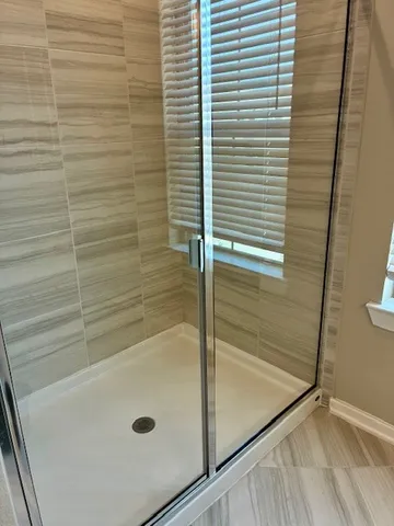a bathroom with a sink and mirror
