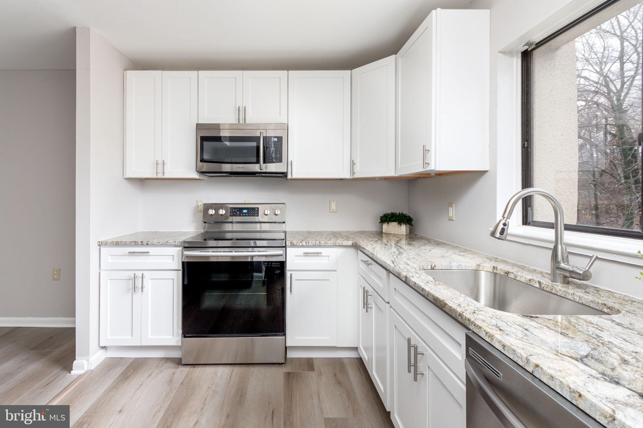 15710 Dorset Road, Unit 103 Laurel, MD 20707 - Photo 7 of 14 New cabinets, counters, stainless steel appliances