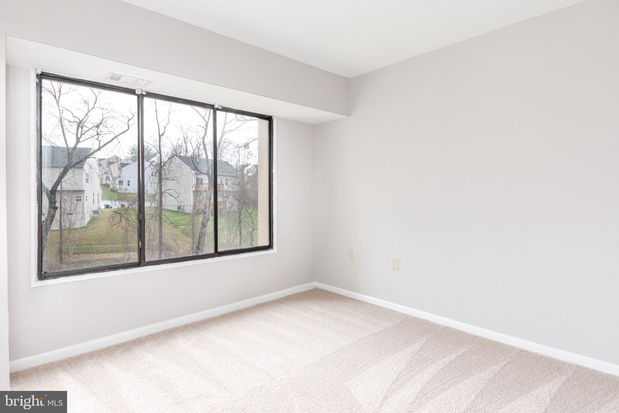 15710 Dorset Road, Unit 103 Laurel, MD 20707 - Photo 9 of 14 Second bedroom with new carpeting