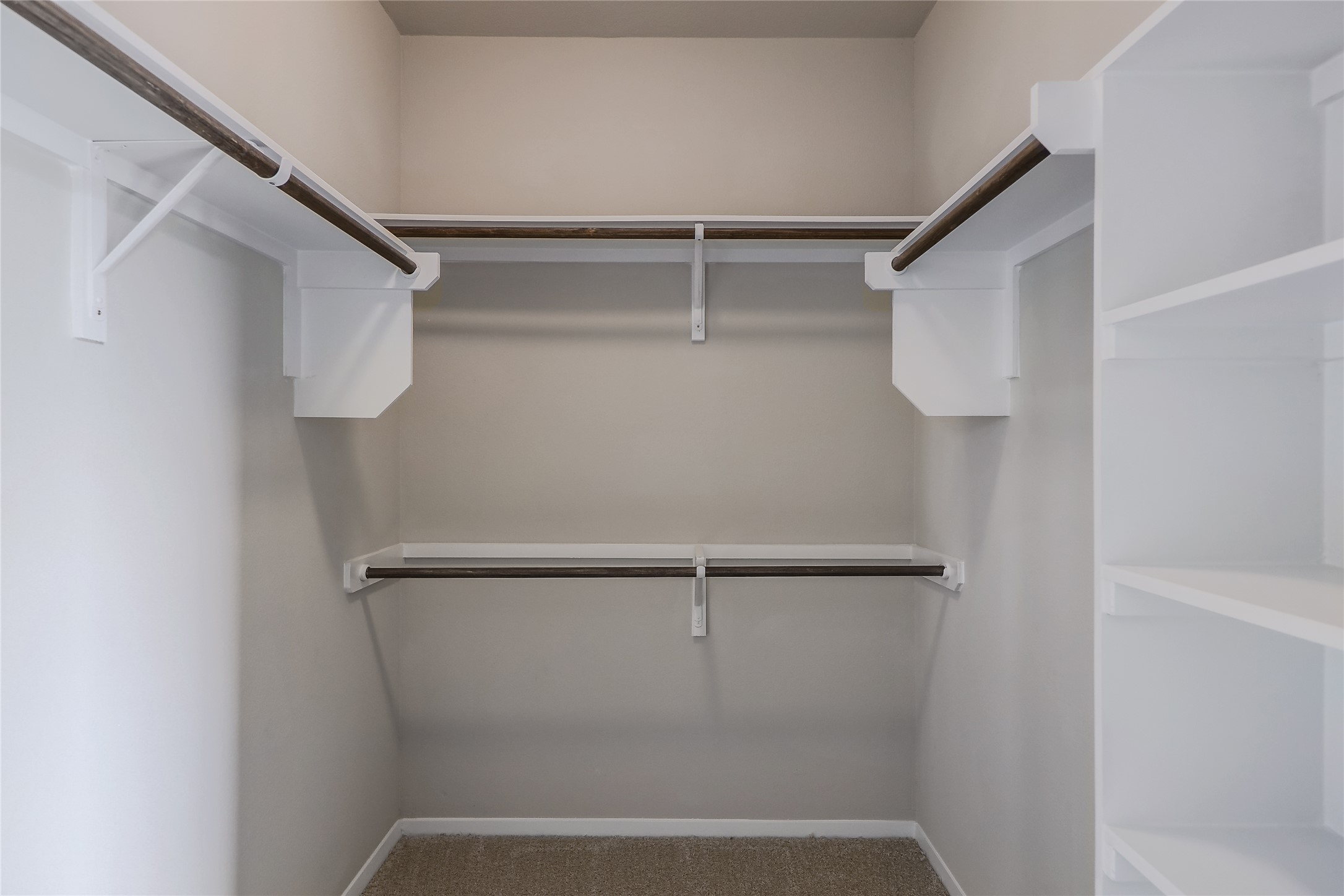 11416 Milano Drive Austin, TX 78747 - Photo 15 of 25 Spacious closet with carpet floors