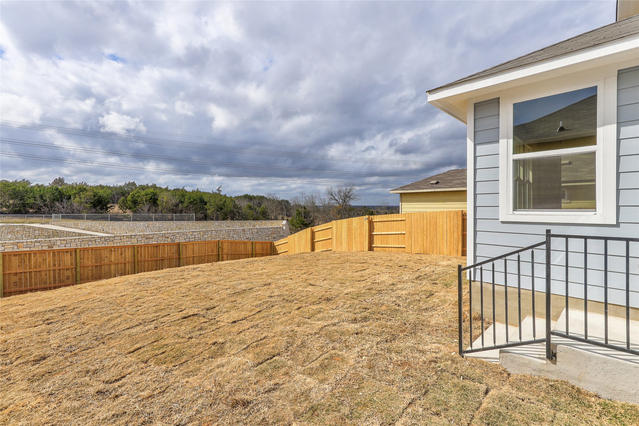 11416 Milano Drive Austin, TX 78747 - Photo 20 of 25 View of fenced backyard