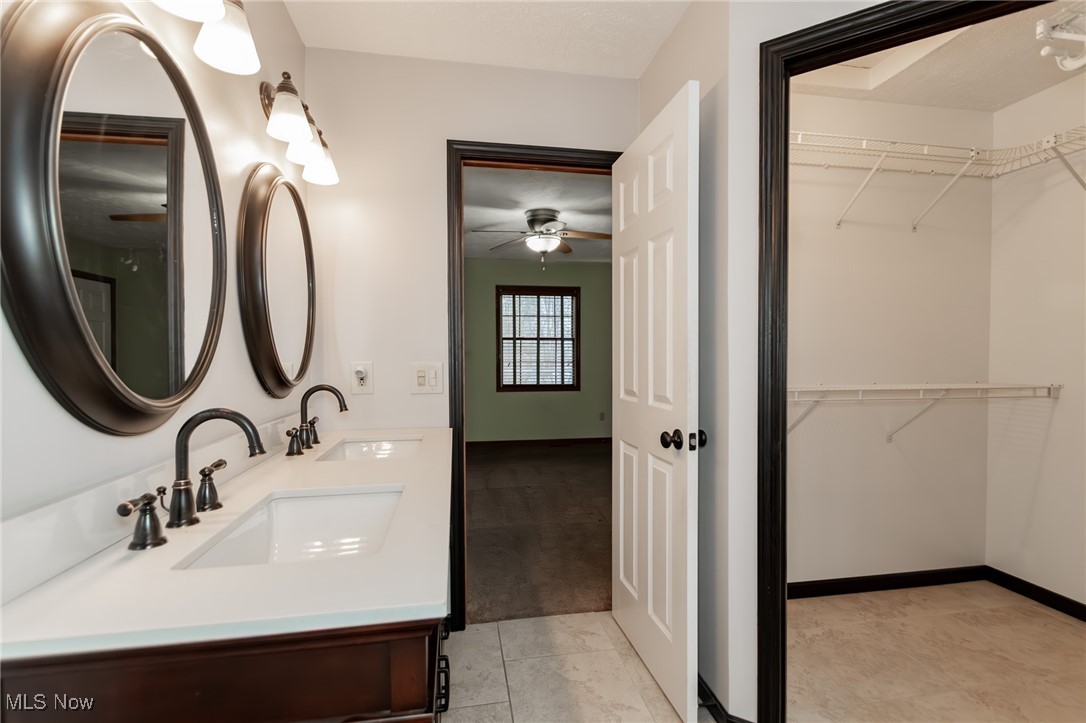 4815 South Ridge Road Perry, OH 44081 - Photo 18 of 48 Full bath with a walk in closet and double vanity