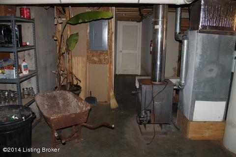 255 Wheeler Road Clarkson, KY 42726 - Photo 44 of 54 Wood Stove in Basement