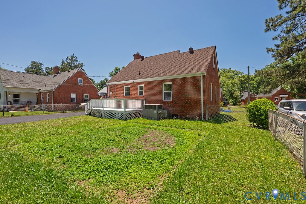 3400 Ryburn Road Richmond, VA 23234 - Photo 40 of 45 Brick exterior featuring a white painted wood deck