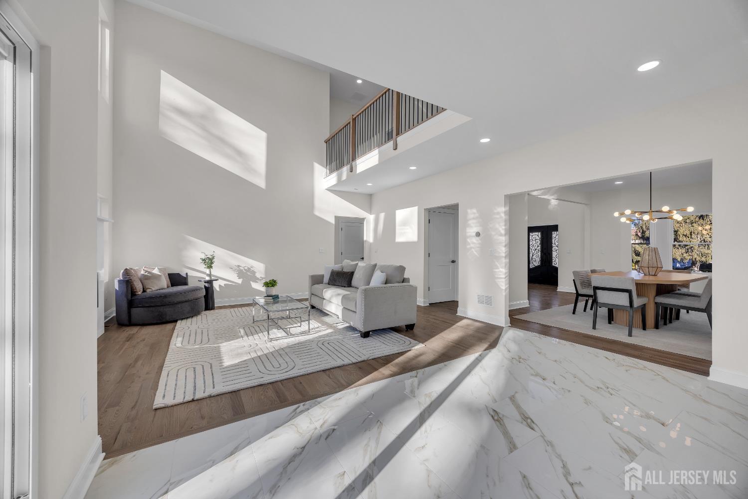 265 West Prescott Avenue Edison, NJ 08820 - Photo 13 of 56 a living room with furniture and kitchen view
