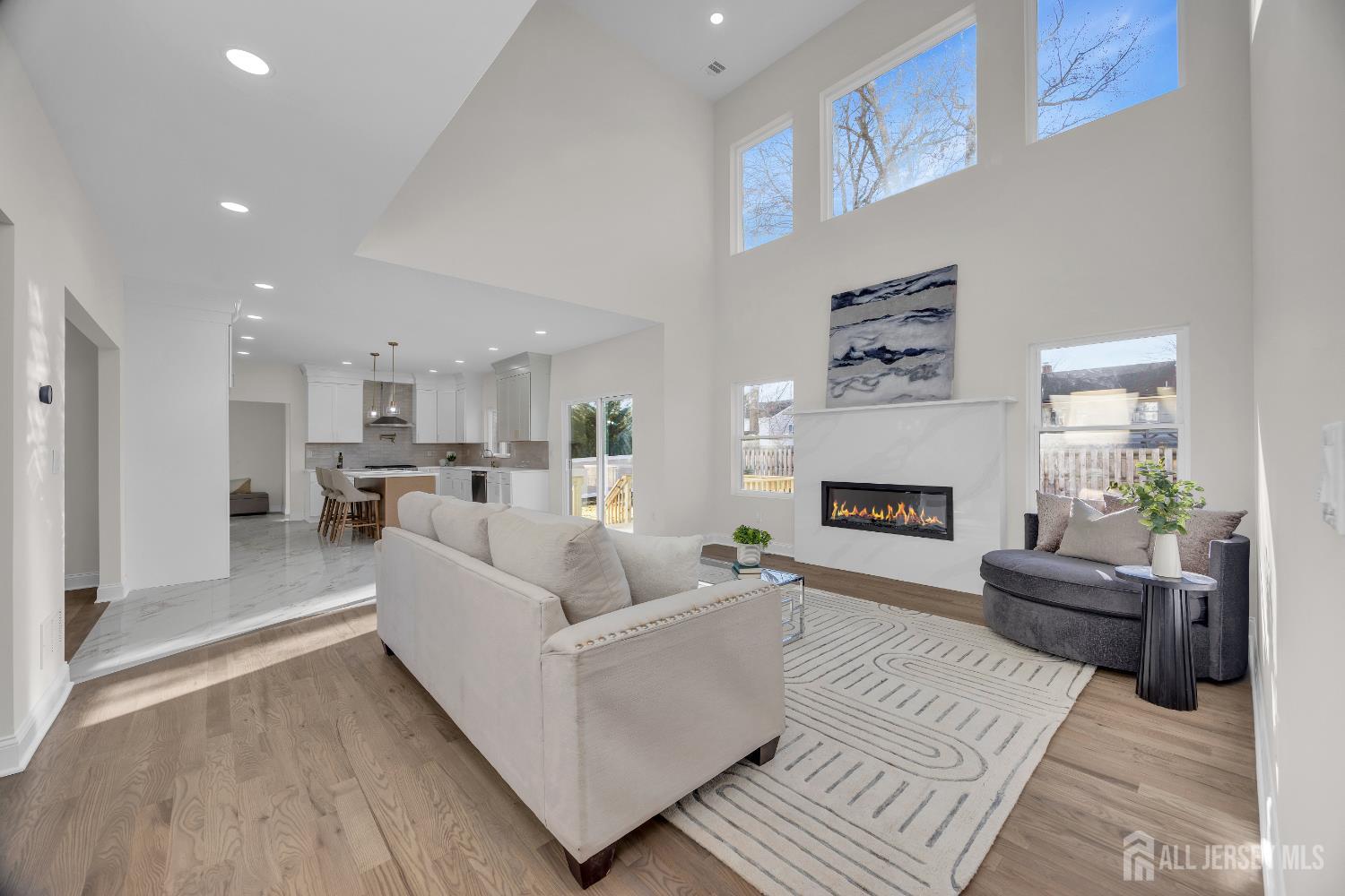 265 West Prescott Avenue Edison, NJ 08820 - Photo 14 of 56 a living room with furniture and a fireplace