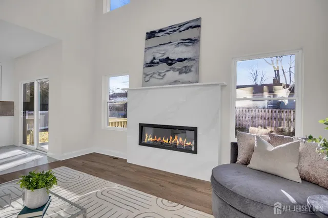 a front view of a house with a yard table and chairs