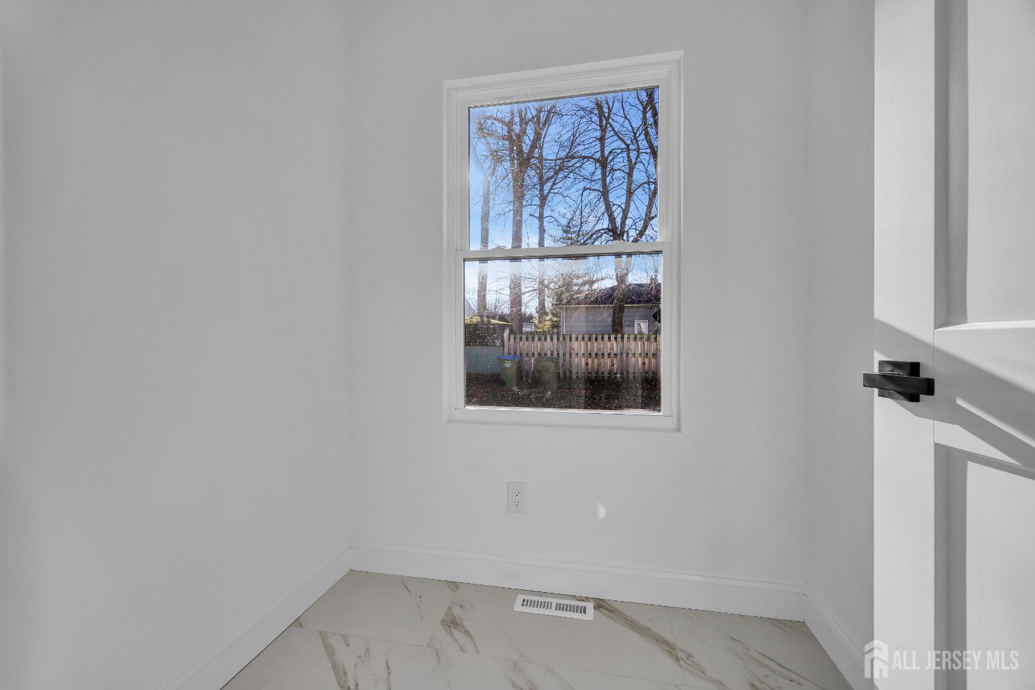265 West Prescott Avenue Edison, NJ 08820 - Photo 26 of 56 a view of a hallway with a painting on the wall