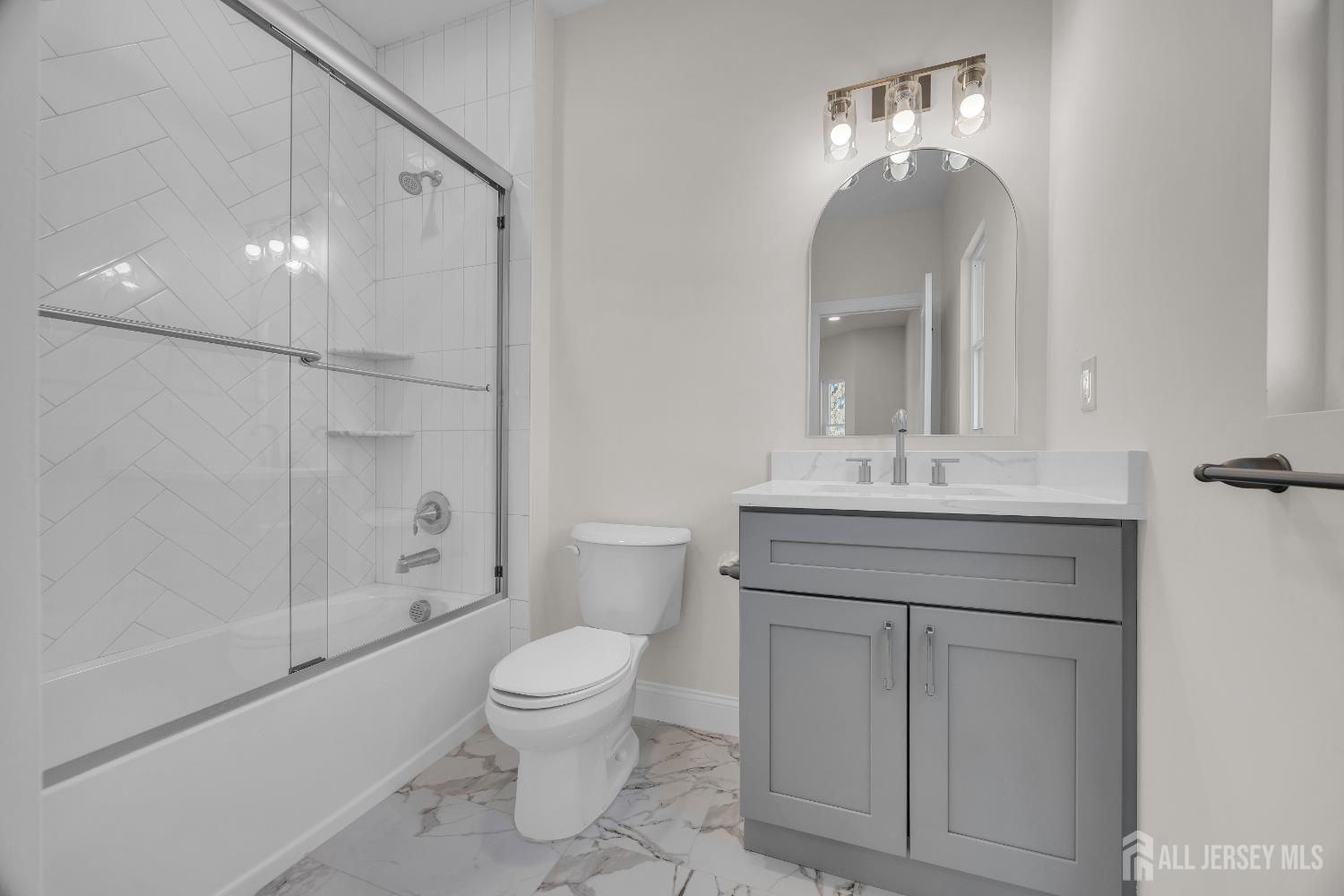 265 West Prescott Avenue Edison, NJ 08820 - Photo 31 of 56 a bathroom with a sink a toilet and shower