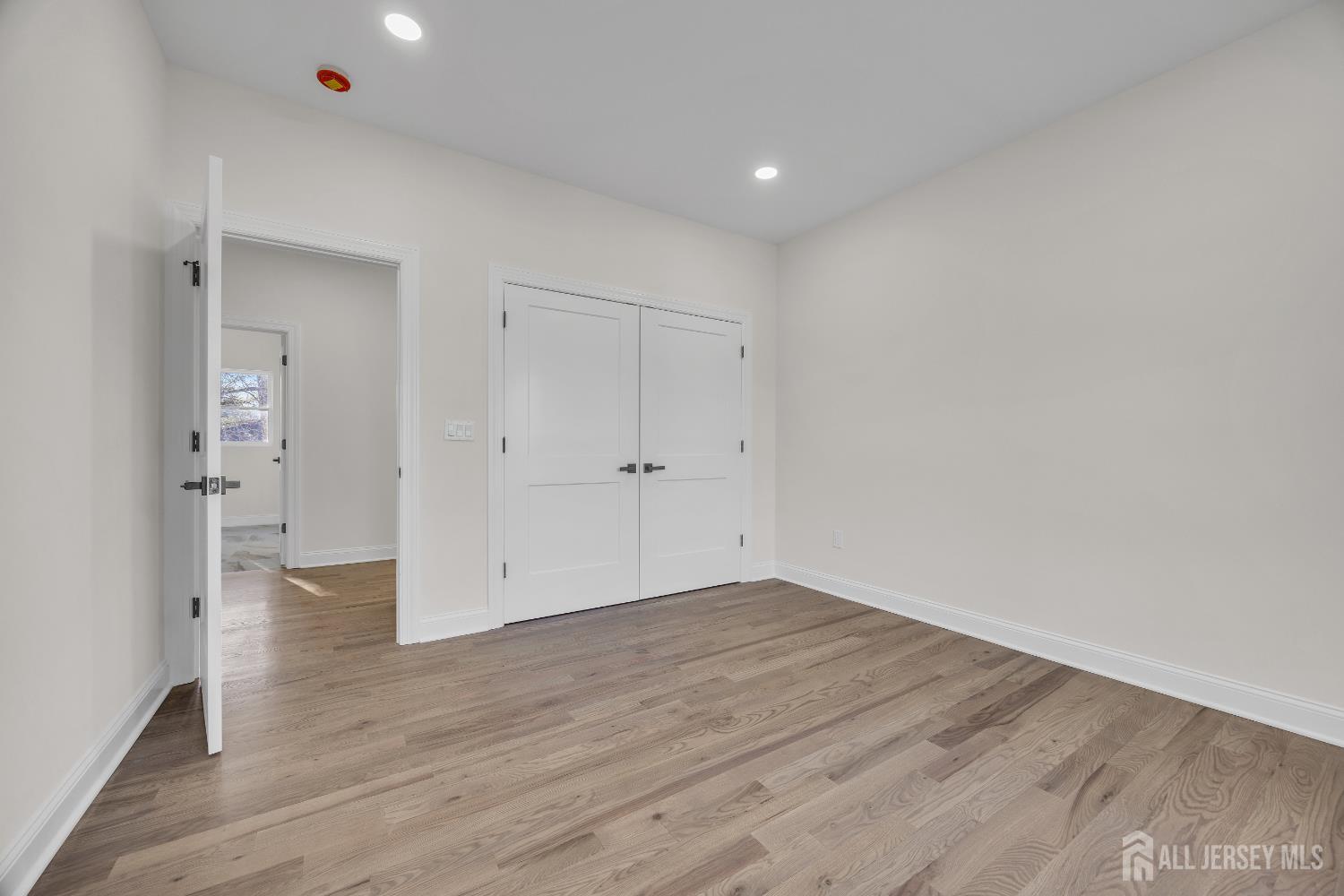 265 West Prescott Avenue Edison, NJ 08820 - Photo 37 of 56 wooden floor in an empty room