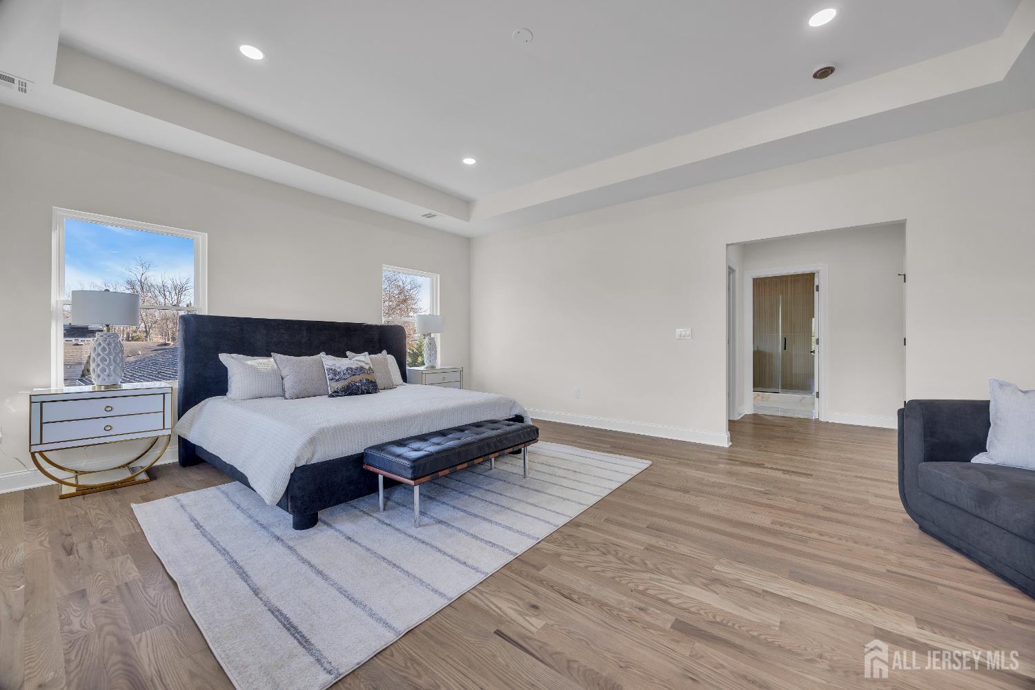 265 West Prescott Avenue Edison, NJ 08820 - Photo 43 of 56 a bedroom with a bed and a couch