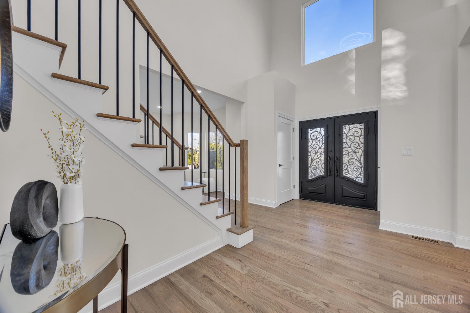 265 West Prescott Avenue Edison, NJ 08820 - Photo 5 of 56 a view of an entryway with wooden floor