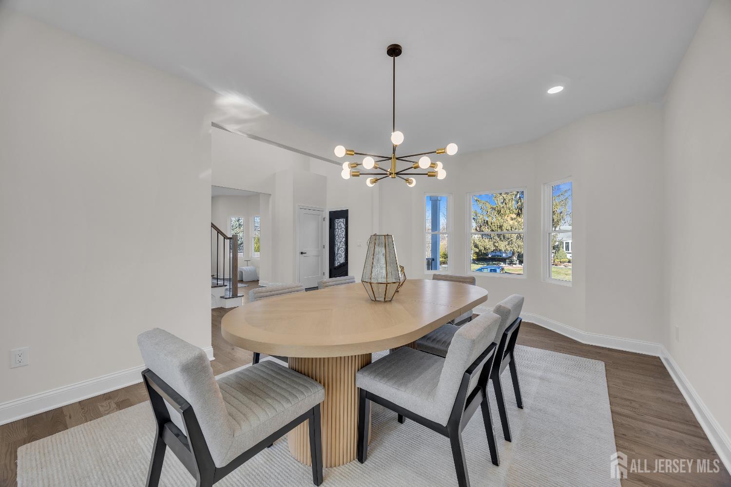 265 West Prescott Avenue Edison, NJ 08820 - Photo 9 of 56 a view of a dining room with a table and chairs