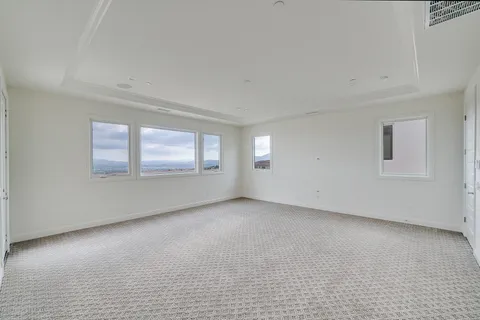 a view of a swimming pool with an ocean view