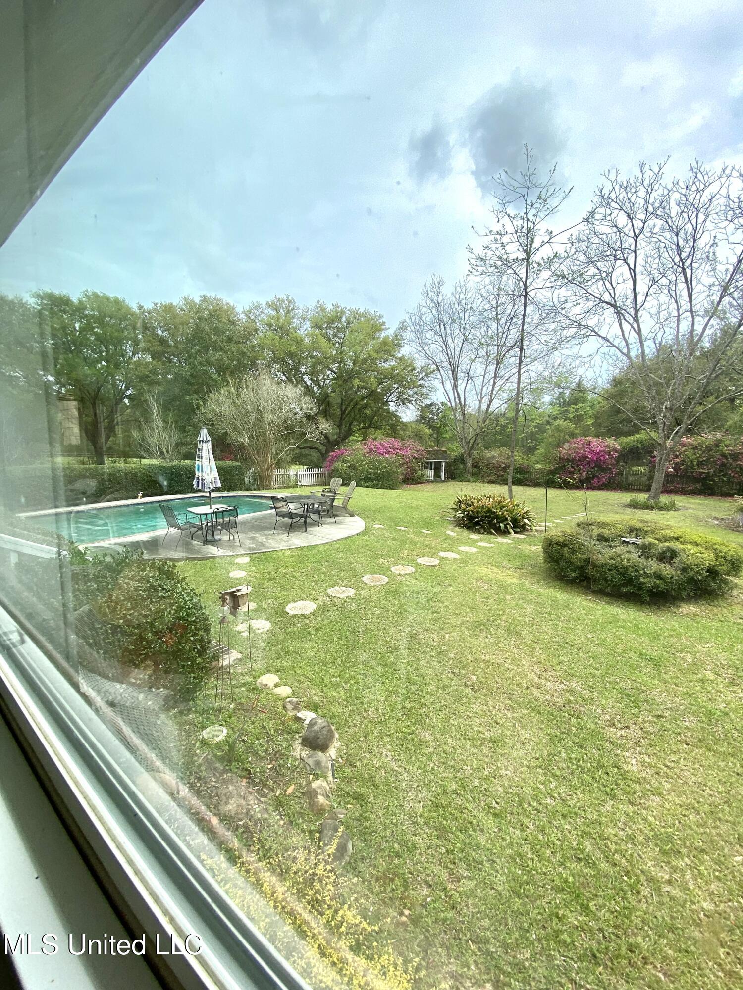 299 Quitman Perry Road Carriere, MS 39426 - Photo 36 of 79 30, Sunroom View, IMG_2882