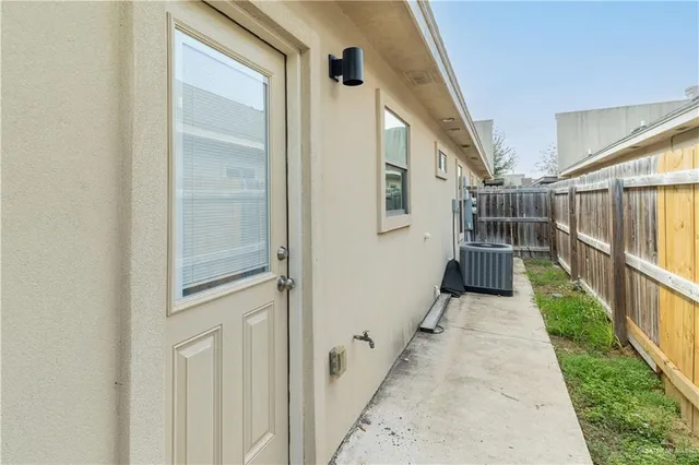 a view of a house with wooden walls