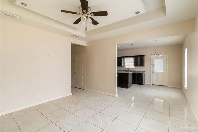 a view of a kitchen with a sink and cabinet