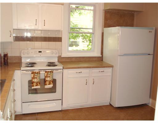 3240 Provost Road Whitehall, PA 15227 - Photo 4 of 17 Kitchen. Neutral tile counter tops, freshly painted cabinets with new appliances will make cooking in this kitchen a great experience.