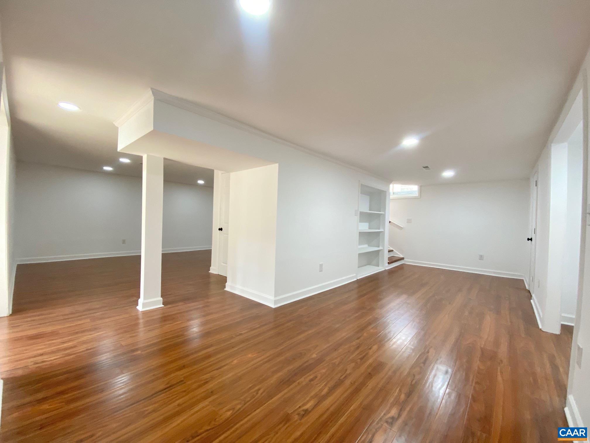 24 Tanglewood Road Palmyra, VA 22963 - Photo 19 of 23 a view of a room with wooden floor and window