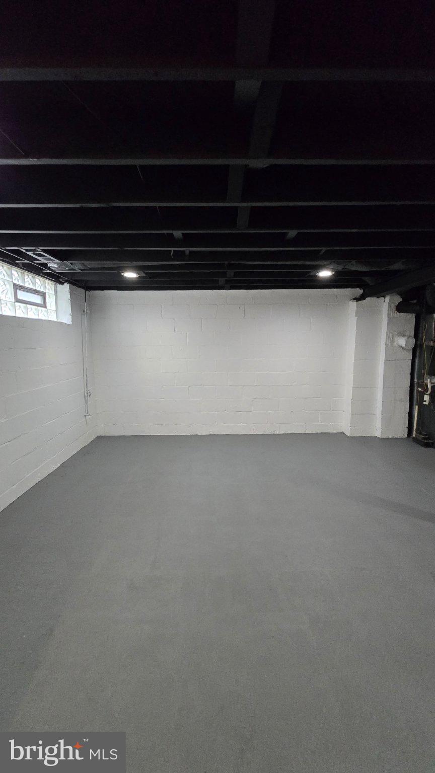 3820 Elkader Road Baltimore, MD 21218 - Photo 39 of 41 Spacious, versatile basement retreat.