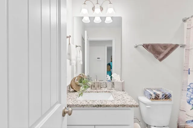 a bathroom with a bathtub and shower curtain
